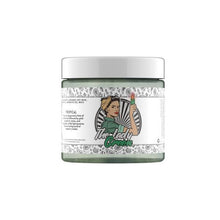 Load image into Gallery viewer, A cylindrical jar labeled &quot;Lady Green Hemp Infused Candle&quot; contains a thick substance, possibly organic soy wax or hemp oil. The label features a vintage-style illustration of a woman dressed in green attire holding a flower, along with a decorative floral border and detailed product information.
