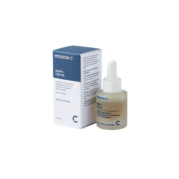 A bottle of Mission C Night + 1000mg CBD Oil - 10ml is placed next to its box. The bottle comes with a dropper cap and contains clear, Broad Spectrum CBD oil. The package provides detailed product information. Both the box and the bottle feature a clean, minimalistic design with blue and white color schemes.