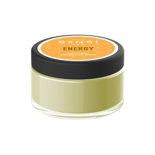 A jar of Sensi Energy 100mg CBD Massage Wax from Sensi CBD is shown. The container is clear with a black lid and an orange label featuring a honeycomb pattern. The label indicates that the natural, vegan-friendly wax is designed to energize and refresh with 100mg of CBD. The jar is filled with a light green substance.