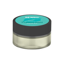 Load image into Gallery viewer, A compact, round, clear plastic container featuring a black lid and labels reading &quot;Sensi Skin&quot; and “100mg CBD Lip Balm - Peppermint,” with 25ml of product. The vegan-friendly label is mint green with white and black text. The CBD lip balm inside appears white.
